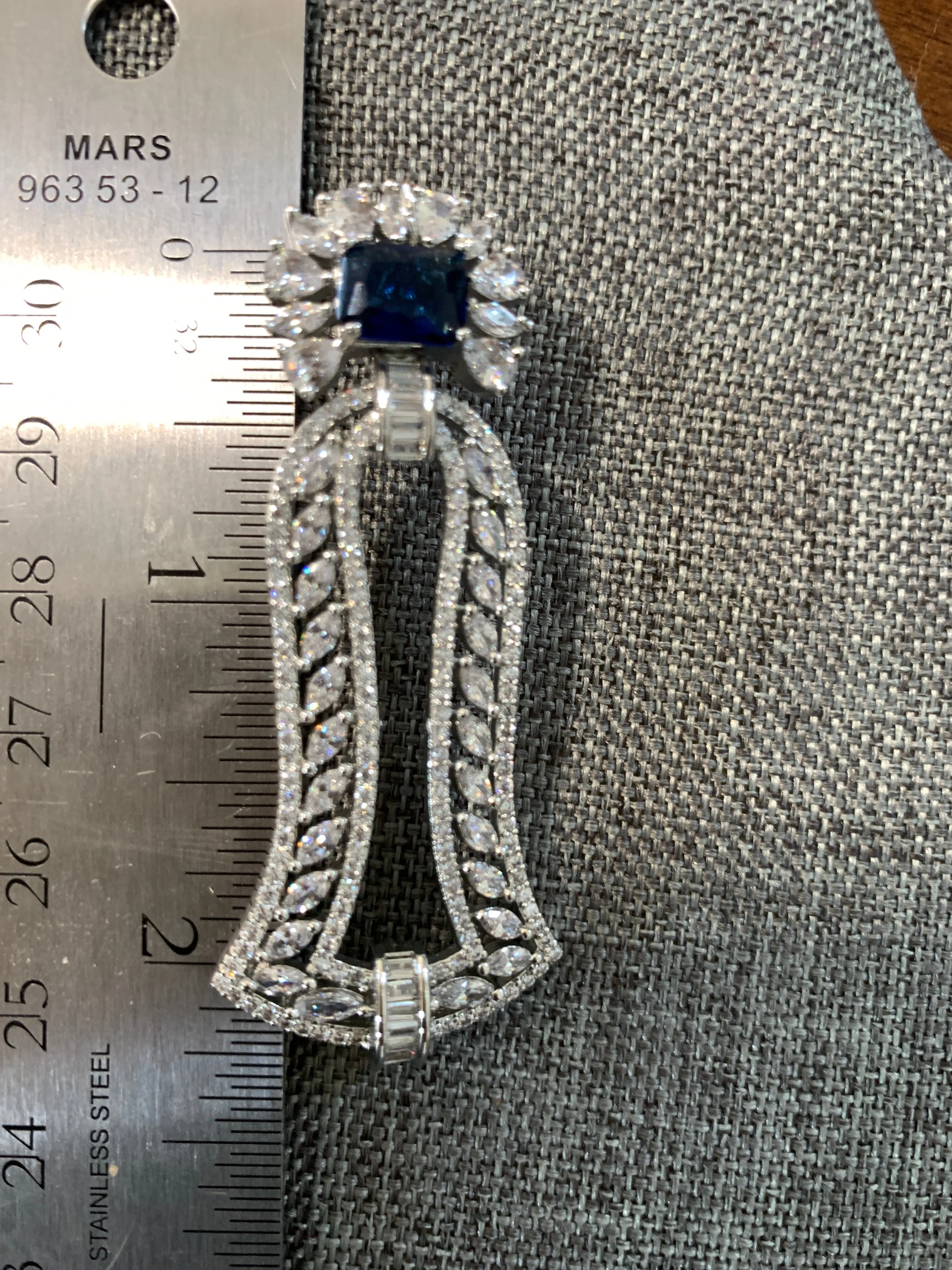 AD Blue Stone Bell Pattern Earrings in Silver Polish