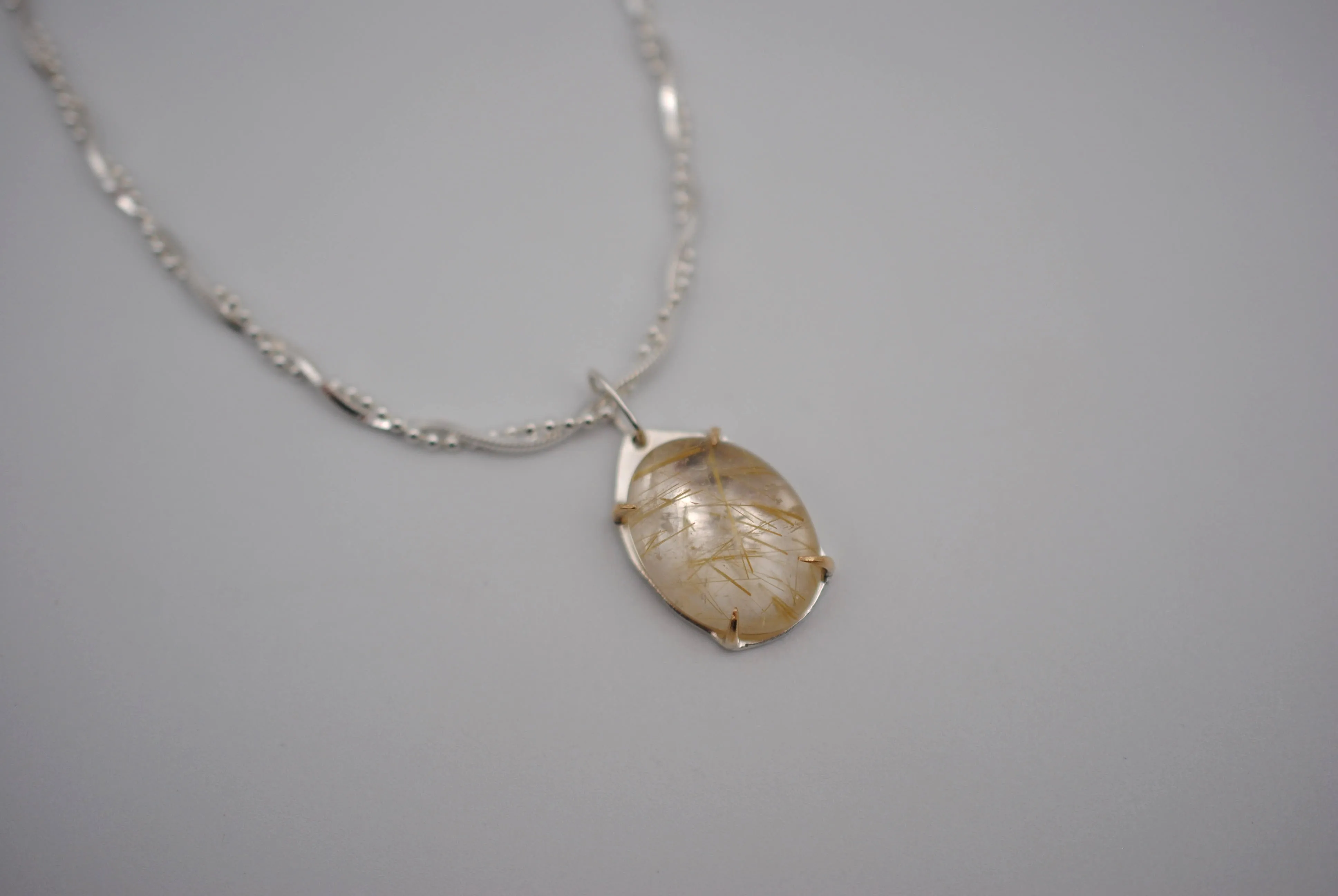 Oval Golden Rutilated Quartz with 14K Yellow Gold Prongs Pendant Necklace on Twisted Snake Box and Ball Chain